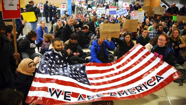 Sit down: A demonstration against Donald Trump's executive order on immigration at Seattle-Tacoma International Airport.