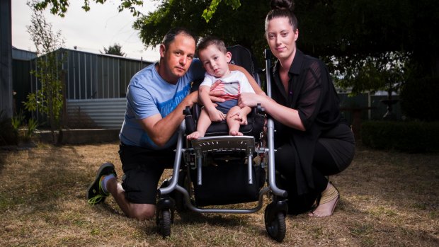 Ben McLennan and Naomi Taylor with their son William McLennan, 2, who has Spinal Muscular Atrophy. 