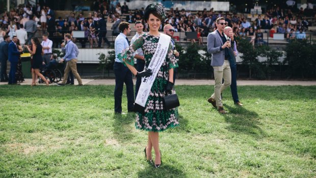 Fashions on the Field women's winner Kate Lynch from Hawksberry in Sydney, in the green and white floral dress her mother made.
