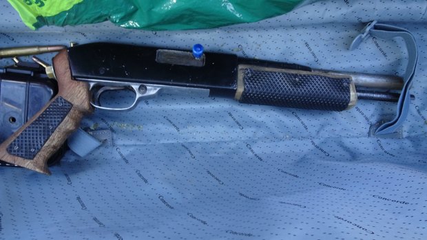 Shotgun seized by police during Saturday's raid on a known bikie associate in Banks.