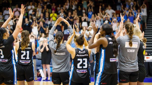 The Canberra Capitals thank their fans after a courageous win over ladder leaders Perth Lynx at the Nation Convention centre on Friday night. Photo: Sitthixay Ditthavong