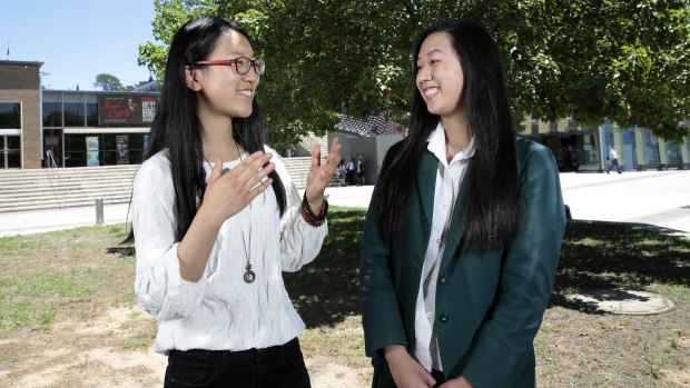 Top year 12 students Jiheng Xu of Canberra College and Vanessa Ma of Canberra Girls Grammar School.
