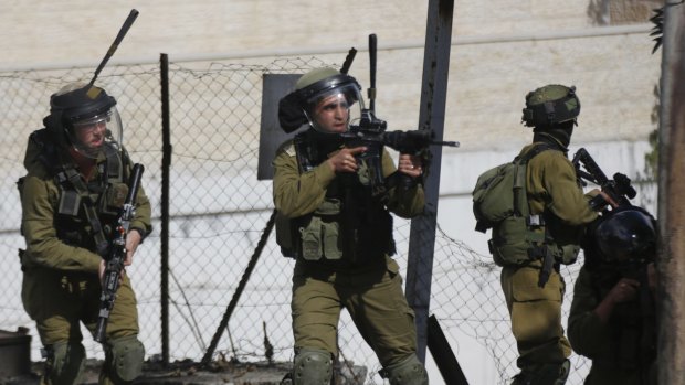 Israeli troops deployed during clashes with Palestinian demonstrators in the West Bank on Friday.