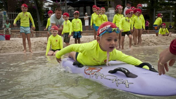 Mica Collier, 5, enjoys the Surf Life Saving Queensland little lifesaver program.