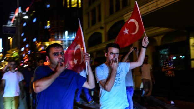 Supporters of the Turkish President march in the streets of Istanbul.