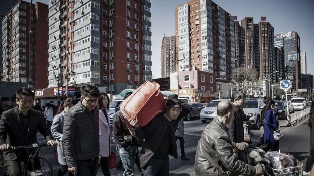 Single Beijing residents will only be allowed one apartment, while married couples can have an apartment and a house.