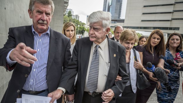 Geoff and Priscilla Dickie, father and mother of Alison Baden-Clay, leave Brisbane Supreme Court after Gerard Baden-Clay's murder conviction was downgraded to manslaughter. 