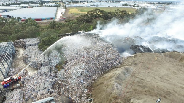 The fire at the SKM recycling plant in Coolaroo is still smouldering. 
