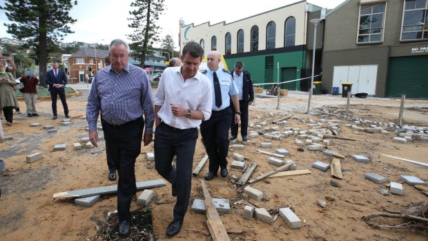 NSW premier Mike Baird inspects storm-damaged Collaroy in June 2016.