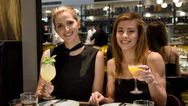 'I'm a massive storm chaser': Brooke Satchwell (right) with Kate Waterhouse at Mercado in the Sydney CBD. 