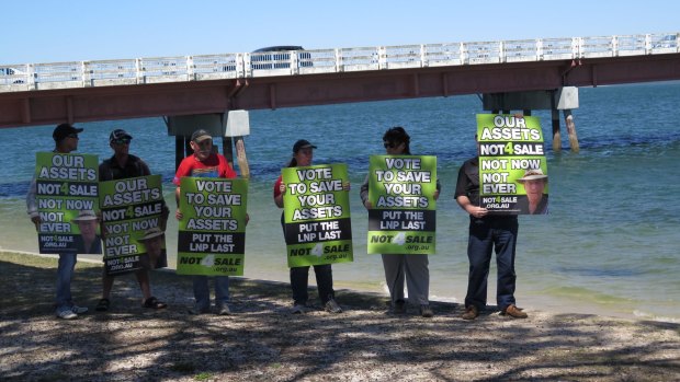 Protesters gather at the announcement of a second bridge to Bribie Island.