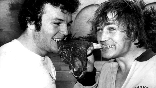 Meat lovers: Les Boyd and Tom Raudonikis get stuck into some raw meat during the infamous 1979 season.