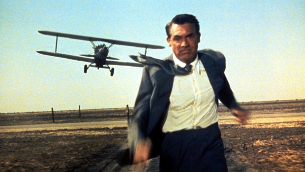 Cary Grant in the infamous cropduster scene in the 1959 Alfred Hitchcock film <i>North by Northwest</i>.