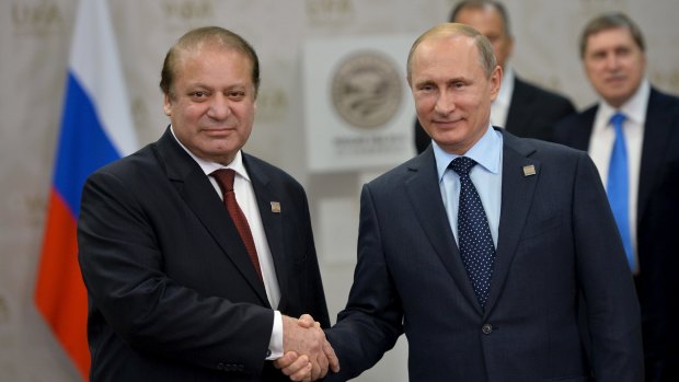 Russia's President Vladimir Putin (right) shakes hands with Pakistan's Prime Minister Nawaz Sharif during the Shanghai Co-operation Organisation (SCO) summit in Ufa, Russia, on Friday.