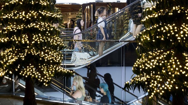 Christmas shoppers have breathed life into the city at night.