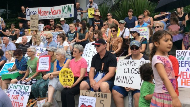 Supporters of the hospital's decision not to release a baby girl back to detention gathered outside on Saturday. 