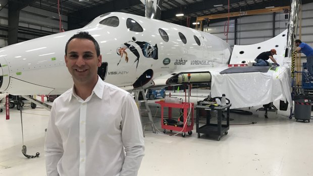 Enrico Palermo, executive vice-president of The Spaceship Company, in front of the VSS Unity at the company's headquarters in the Mojave Desert. 