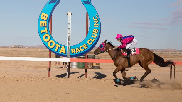 Keith Ballard riding Manfred the Man to win the Birdsville Bakery Betoota Cup by 3 1/2 lengths.
