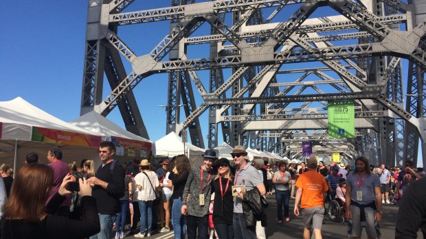 Crowds wander Eat St Markets on the Story Bridge for its 75th birthday celebrations.