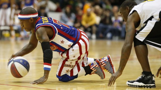 Little marvel: Too Tall Hall is the smallest player in Harlem Globetrotters history.