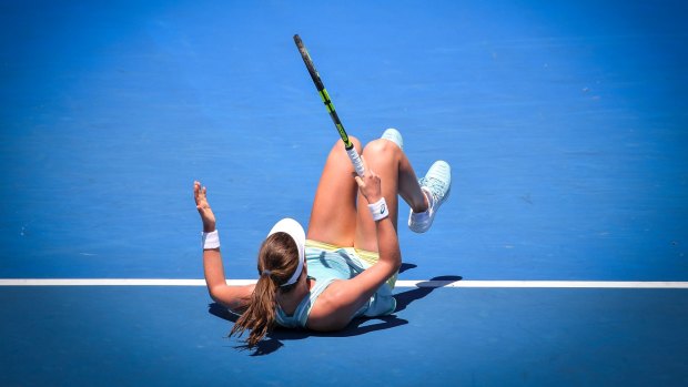 Konta took a tumble but played out the match.