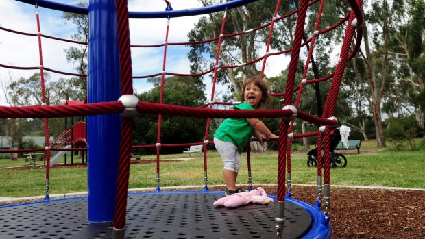Local resident, 20-month-old Cassidy Rando, enjoys the new equipment.