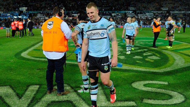 Now that's a paddlin': Luke Lewis looks dejected after Cronulla's loss to North Queensland at 1300SMILES Stadium.