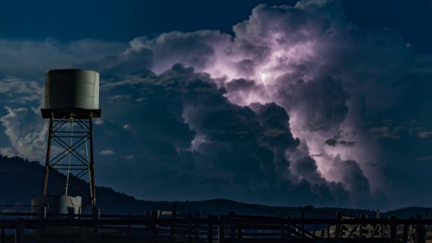 Canberra photographer, Ian Williams from Calwell, captured Tuesday's storm, lit up by a supermoon.