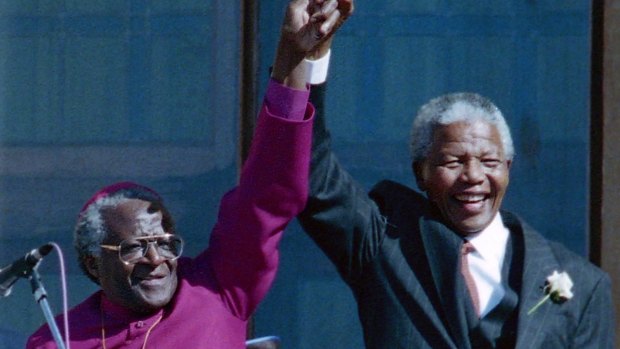 The late Nelson Mandela with former Bishop Desmond Tutu in Cape Town in 1994.