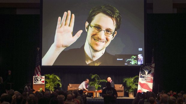 Edward Snowden appears on a live video feed broadcast from Moscow at an event in Hawaii in February 2015. 