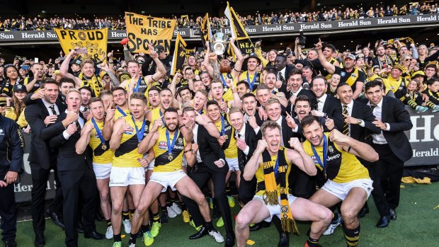 The drought has broken - Richmond celebrate their grand final win over Adelaide.