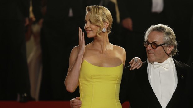 Charlize Theron and director George Miller at the screening of <i>Mad Max: Fury Road</i> in Cannes.