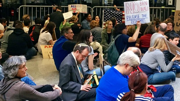 Demonstrators stage a sit-in at San Francisco International Airport.