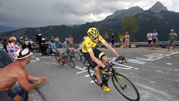 In control: Chris Froome powers up a mountain.