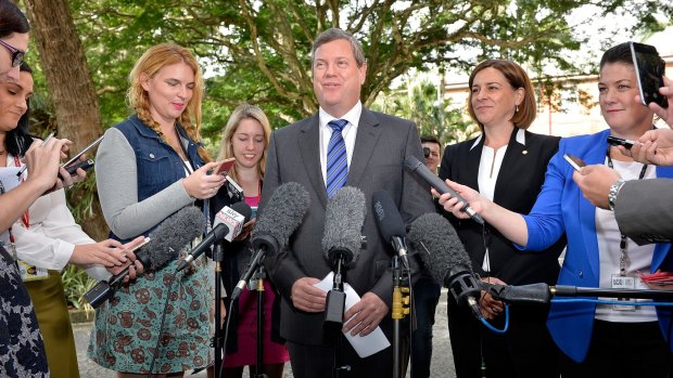 Victorious LNP leader Tim Nicholls speaks at a press conference with new deputy Deb Frecklington (right) following the spill.