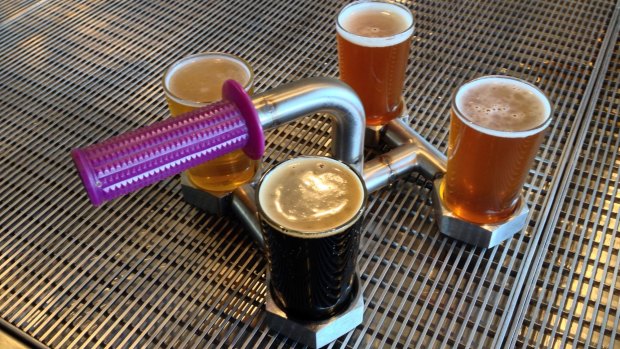 The serving paddle at BentSpoke Brewing Company incorporates a bike handlebar.