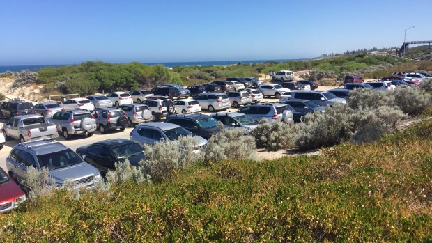 Just sun, sand and a sea... of cars at Leighton. 