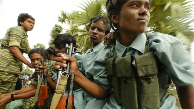 Tamil Tiger women searching for bodies on the beaches in Sri Lanka's north province, then totally controlled by the Tamil Tigers, after the 2004 tsunami.