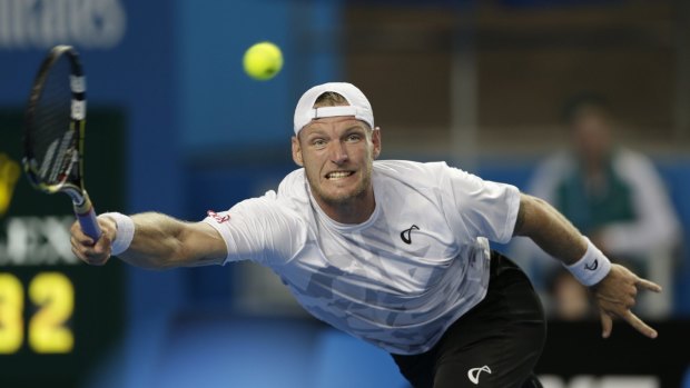 Sam Groth stretches for a ball on his way to defeating Thanasi Kokkinakis in five sets.