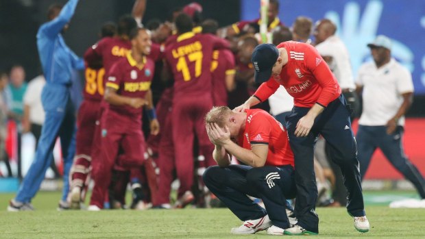 England's Ben Stokes is consoled by his captain Eoin Morgan following their loss.