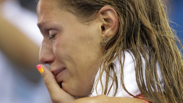 Russia's Yulia Efimova cries after placing second in the women's 100-meter breaststroke final.