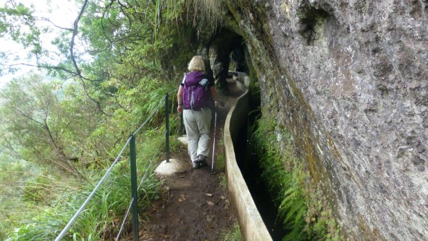 Hitting the trail: Entering the levada rock tunnels.