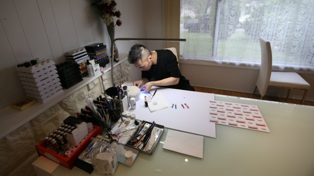 Nail artist Jonny Diep Pham in his home studio in Liverpool.