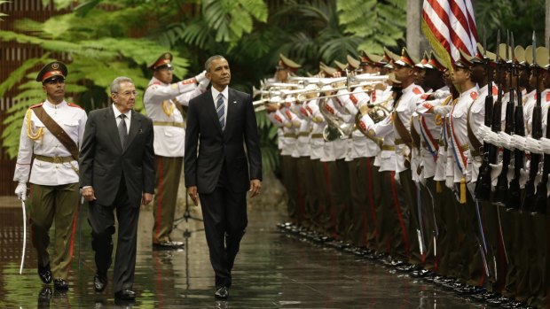 Mr Castrol and Mr Obama inspect the guard at the Revolution Palace in Havana in March. 