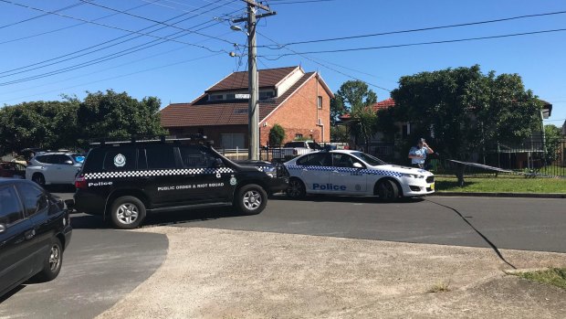 Police blocked off a section of Eddy Street, Merrylands, after a fatal shooting on Friday night.