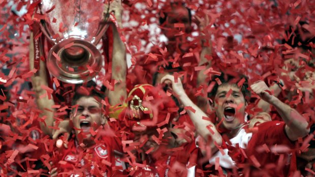 Steven Gerrard lifts the 2005 Champions League trophy after Liverpool beat AC Milan in 'the Miracle of Istanbul'.