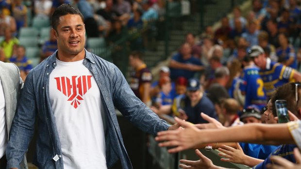 Hayne greets fans at Pirtek Stadium before the round one match in March between the Eels and Broncos.
