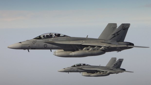 RAAF F/A-18F Super Hornets return after completing a combat mission over Iraq. 
