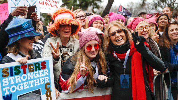 Gloria Steinem, centre right, greets protesters at the barricades before speaking at the Women's March on Washington in January. Protests in Washington have been a boon for the portable toilet business.