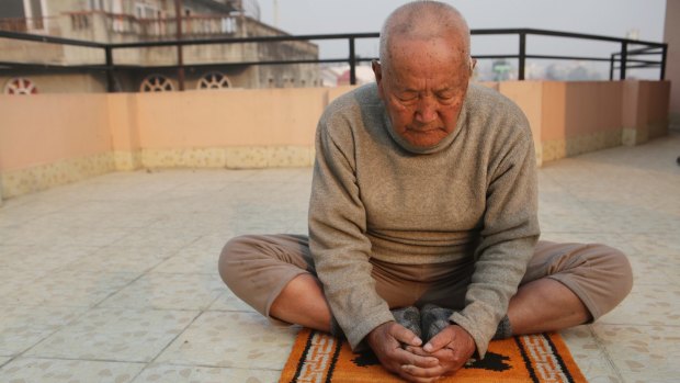 Nepalese mountain climber Min Bahadur Sherchan, does his morning Yoga at his residence in Kathmandu, Nepal, Wednesday, April 12, 2017. The 85-year-old climber who was once the oldest person to scale the world?s highest mountain is heading back to Mount Everest in hopes of scaling the peak and regaining the title. Sherchan is aiming to scale the peak next month when there is window of favorable weather on the summit. (AP Photo/Niranjan Shrestha)